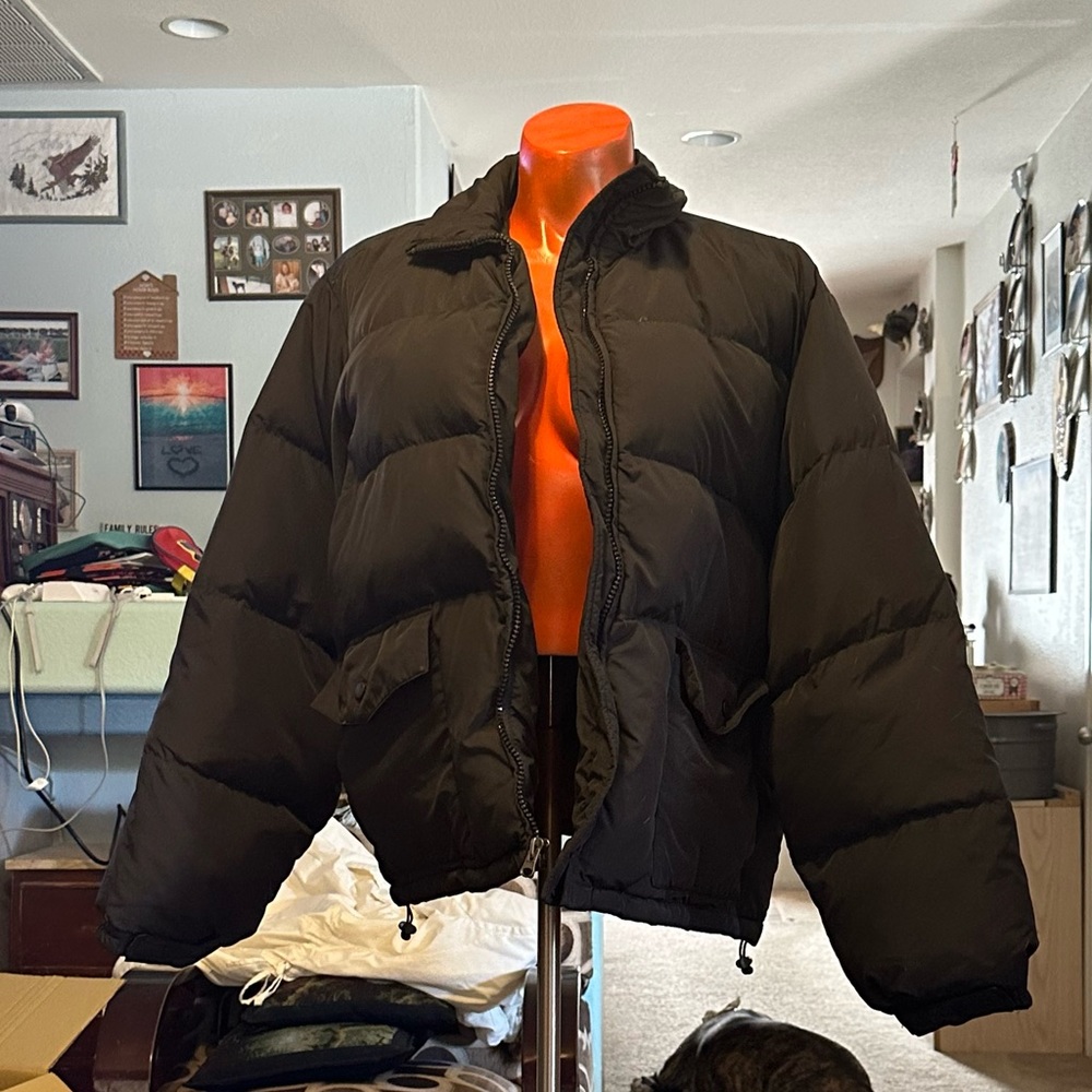 This is a black puffer jacket, extra-large Athleta tech brand great condition